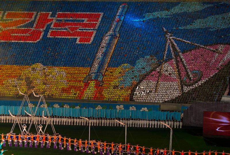Illustration for article titled The Amazing, Colorful Flip Card Propaganda Mosaics of North Korea